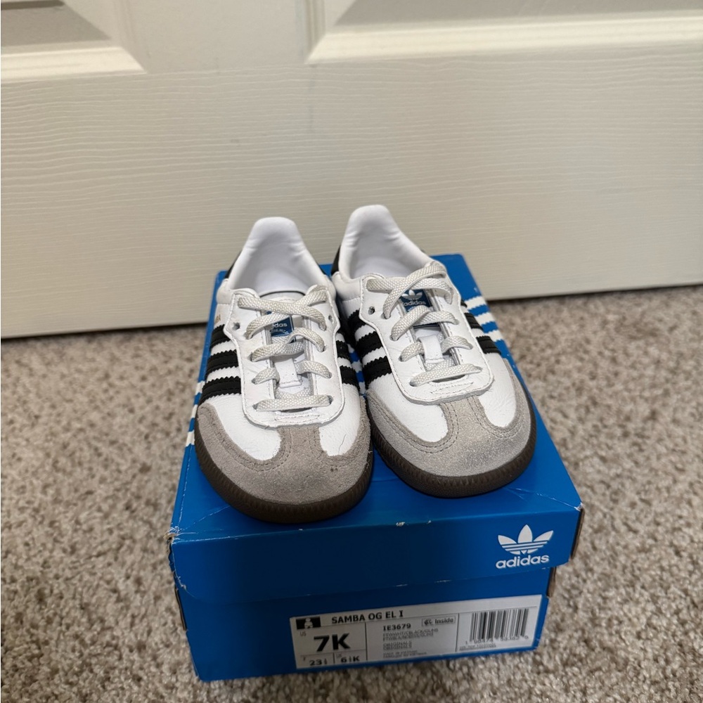 Adidas White and Black Sneakers with Retro Design